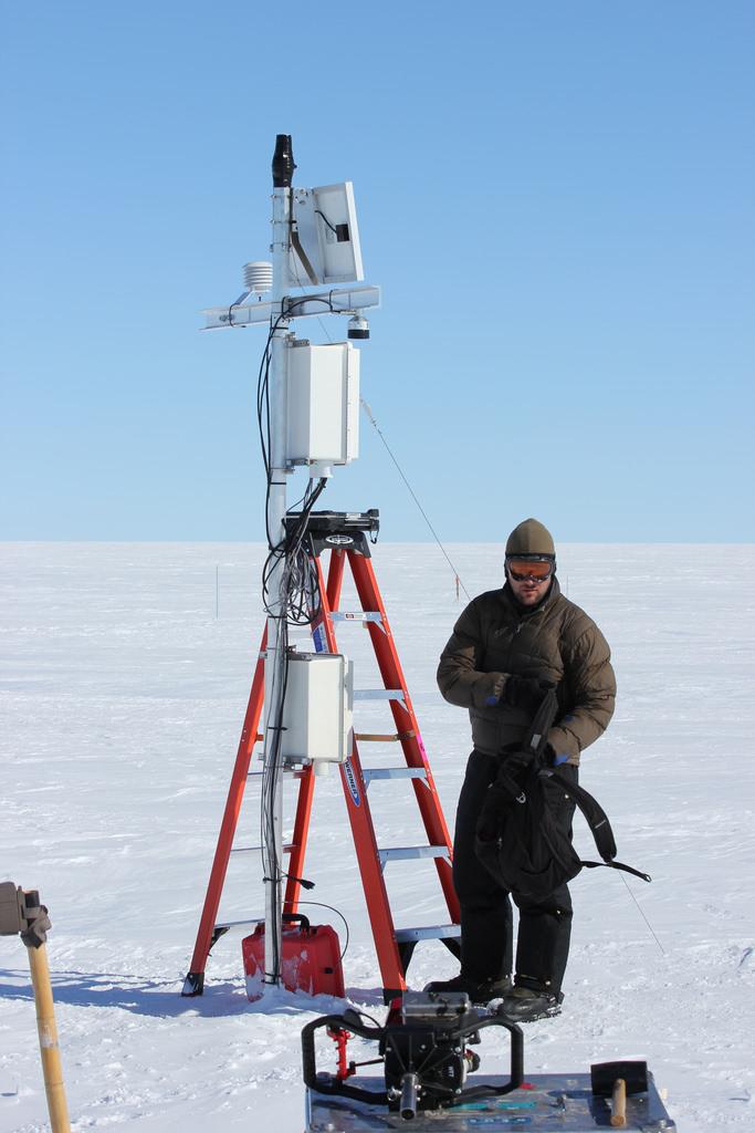 Mike MacFerrin maintaining a FirnCover station in Greenland