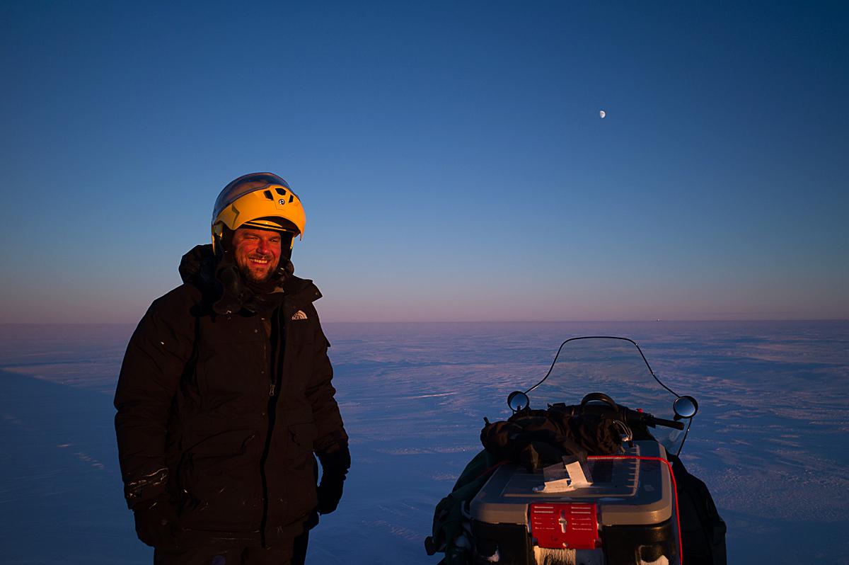 Mike MacFerrin on a late-evening snowmobile traverse, southwest Greenland